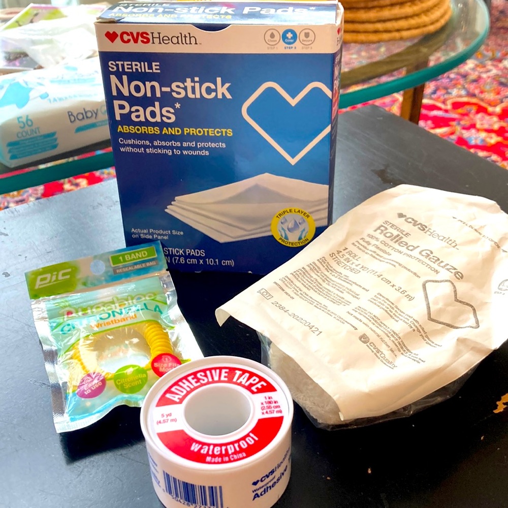 First Aid summer kit. Non stick pads tape citronella bands gauze.